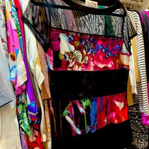 Never worn! Beautiful blouse. Sheer on top.